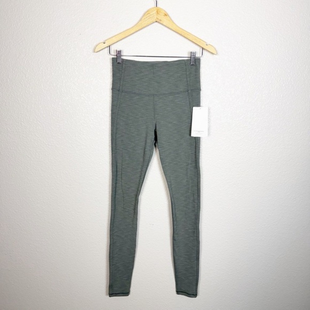 Athleta Elation Over the Heel Leggings Size S‎ Green Grey High Rise Active